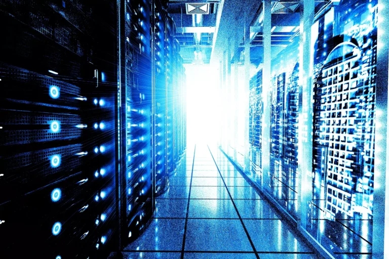 An data center interior photo, shows an aisle between rows of tall server racks, stylized blue and sepia color tone.